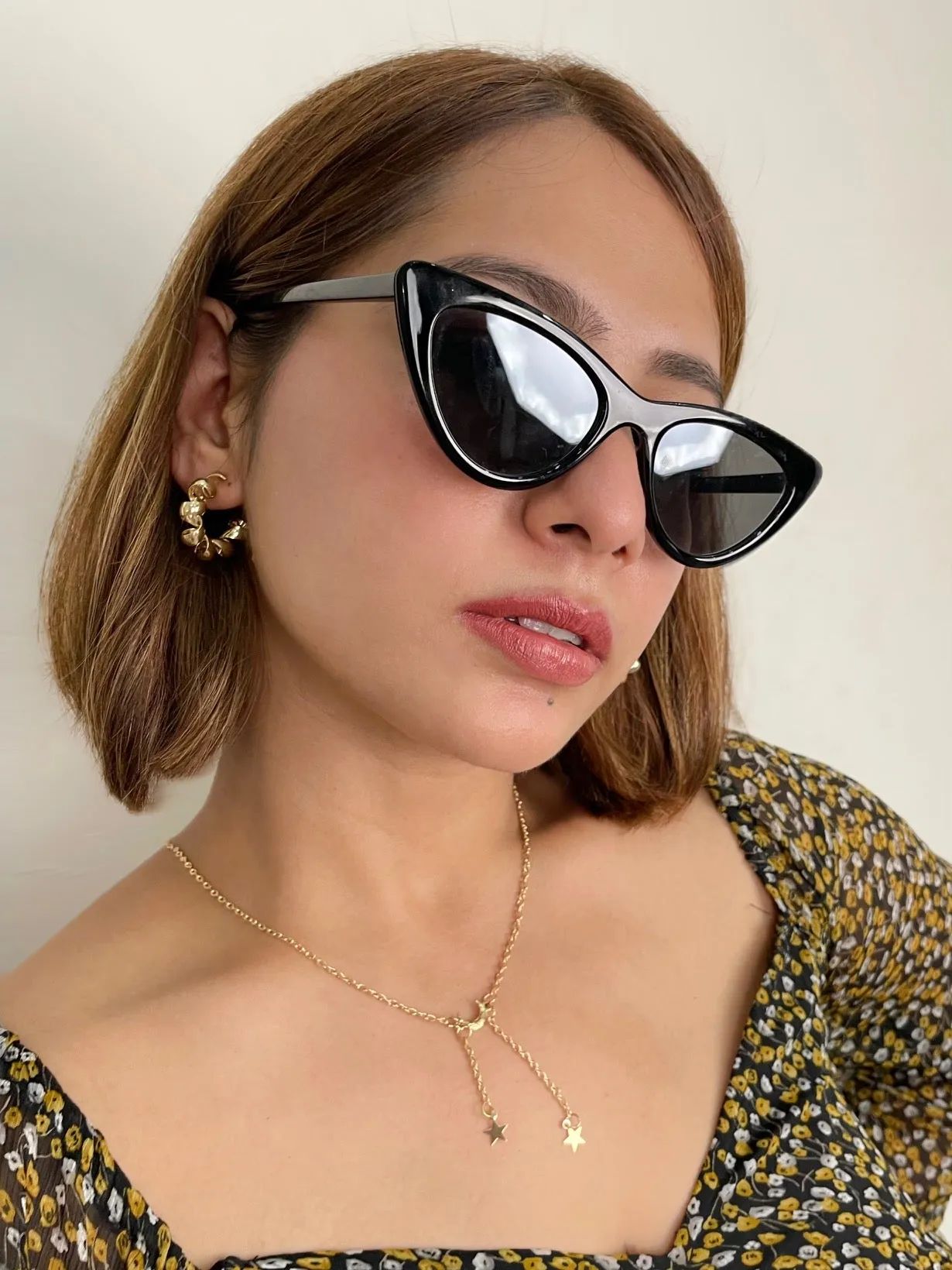 Gold Twisted Statement Hoops